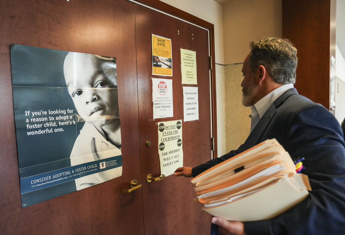 mattstonephotog's tweet image. Former Kentucky governor Matt Bevin arrives for a court hearing regarding an EPO filed against him by adopted son Jonah. On the courtroom door was a poster for adoption.
