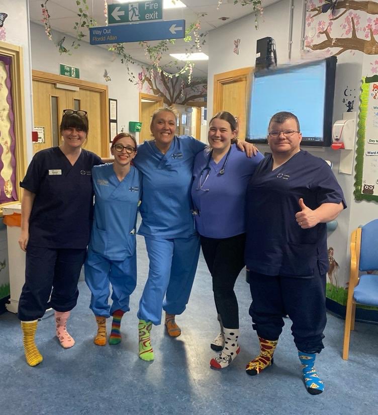 Morriston Hospital Paeds rocking their socks today for #WDSD 💙💛💙🙏 <a href="/SwanseabayNHS/">Swansea Bay NHS</a>