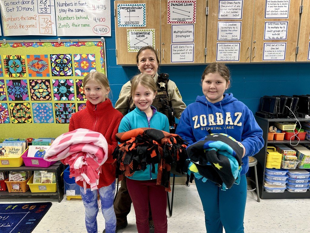 The 3rd Grade Class celebrated " I love to read month" making blankets. The classroom donated 3 of them to the Otter Tail Co Sheriff's Department as they will be given to accident victims.