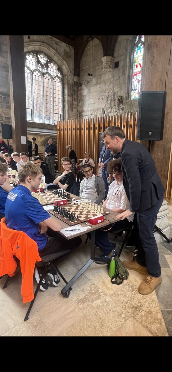 allison badacsonyi (@abadacsonyi) on Twitter photo British Champion Gawain Jones playing the ceremonial first move for Stanley at the Chessmates International Tournament in York this morning. Stanley drew, and England beat Iceland 7-3 <a href="/ecfchess/">English Chess Federation (ECF)</a> <a href="/ECFonlinechess/">ECFonline</a> <a href="/ecfchess/">English Chess Federation (ECF)</a> <a href="/chessmates_intl/">ChessMates</a> <a href="/richardpalliser/">Richard Palliser</a> British Champion Gawain Jones playing the ceremonial first move for Stanley at the Chessmates International Tournament in York this morning. Stanley drew, and England beat Iceland 7-3 <a href="/ecfchess/">English Chess Federation (ECF)</a> <a href="/ECFonlinechess/">ECFonline</a> <a href="/ecfchess/">English Chess Federation (ECF)</a> <a href="/chessmates_intl/">ChessMates</a> <a href="/richardpalliser/">Richard Palliser</a>