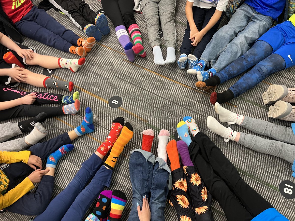 Miss Daniel's class is celebrating World Down Syndrome Day by wearing cool socks. Many students also wore blue and yellow to celebrate!  They read books about inclusion, and learned about how to celebrate our differences.