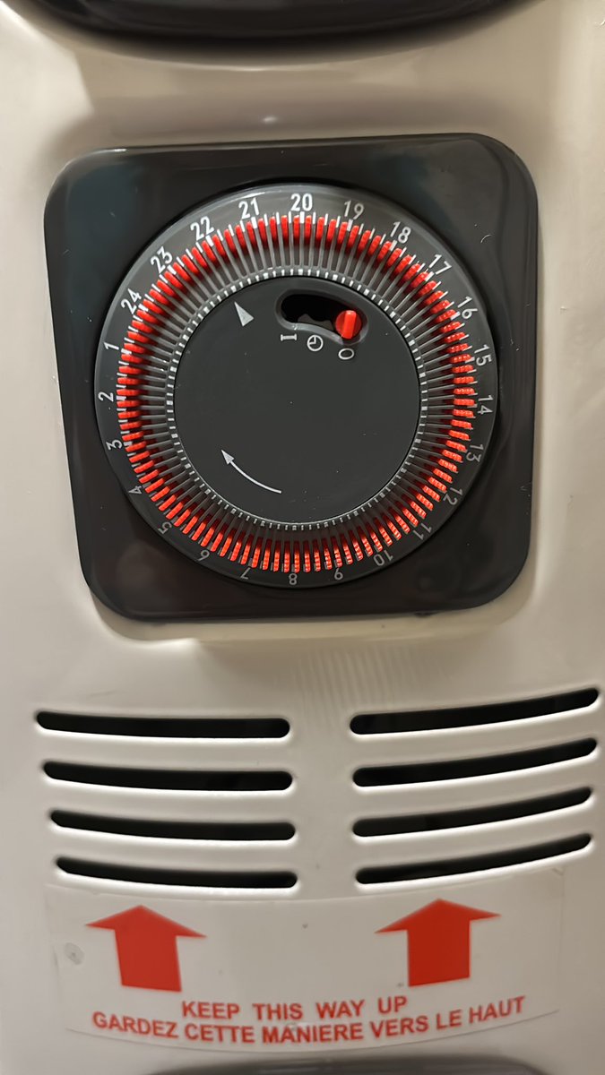 Anyone know how to use this kind of heater?  

I don’t really understand the red switches on the bottom dial and I can’t find the make/model