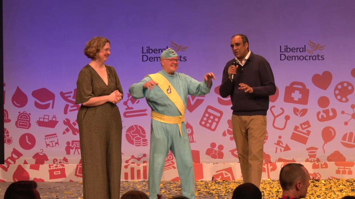 Something very strange is happening at <a href="/LibDems/">Liberal Democrats</a> spring conference. <a href="/CliveJonesMP/">Clive Jones MP</a> has just turned up dressed as a Thunderbird.
