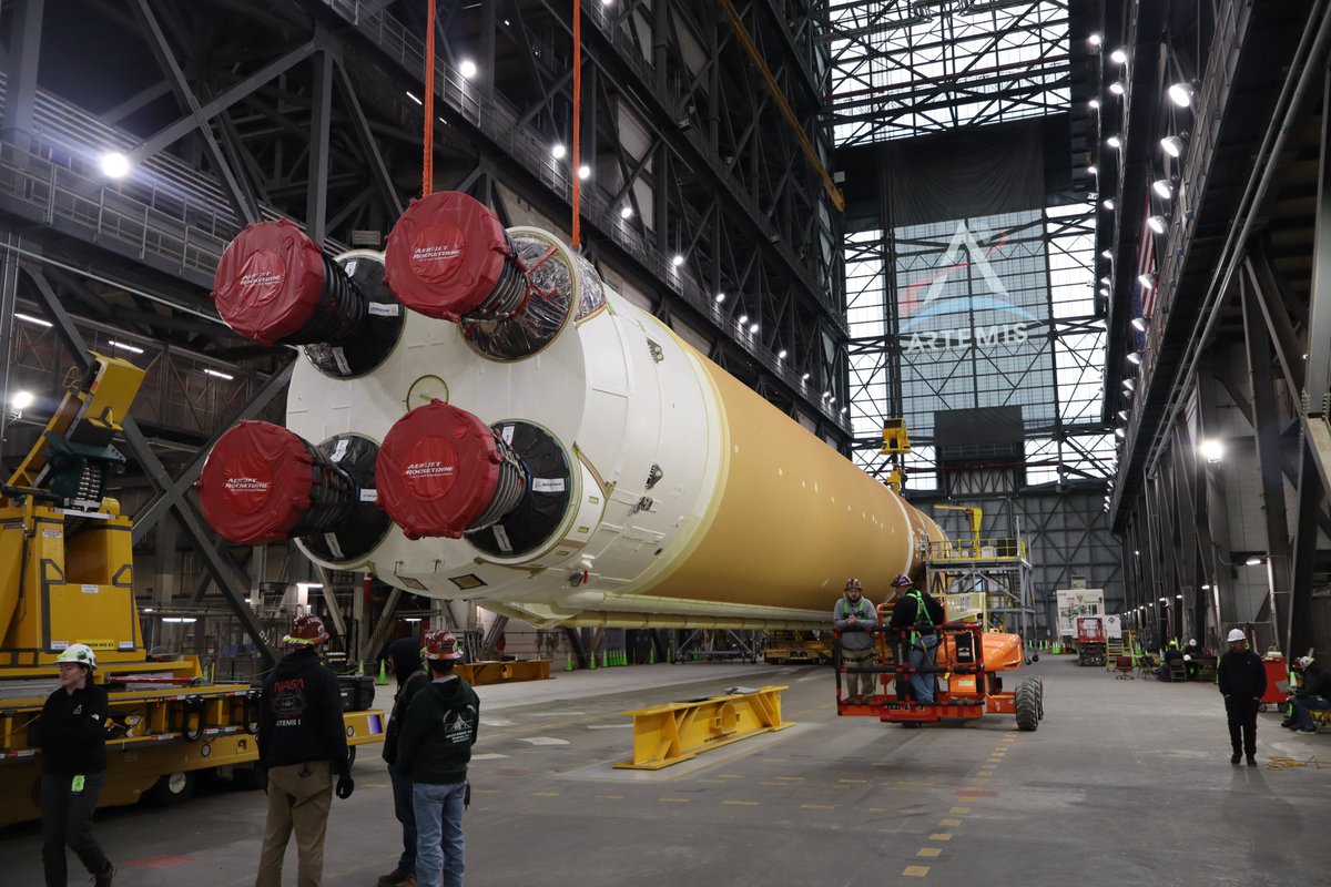 NASAGroundSys's tweet photo. We're rolling! 🎥

Exploration Ground Systems teams are preparing to stack the @NASAArtemis II @NASA_SLS core stage onto mobile launcher 1.

Teams repositioned the core stage using self-propelled modular transporters to roll it in front of the Vehicle Assembly Building's High Bay 3. Teams have also been staging platforms in the high bay, preparing the cranes for lifting, and ensuring the boosters are ready to receive the core stage.
