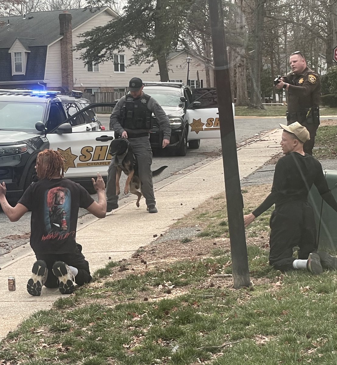 A former assistant football coach at Saint Charles High in Waldorf &amp; a 17 yr old player on the team were arrested for an alleged armed robbery of a man &amp; his 9 months pregnant girlfriend! Pics from a witness show coach Marquise Taylor &amp; a third suspect getting arrested Wednesday.