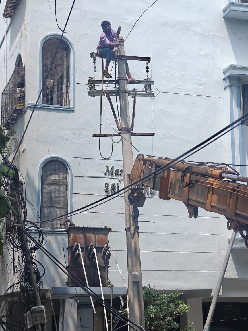 Damaged Pole due to falling of tree in the night hrs rectification work in Gandhi Nagar section of Saifabad division in Hyderabad Central circle