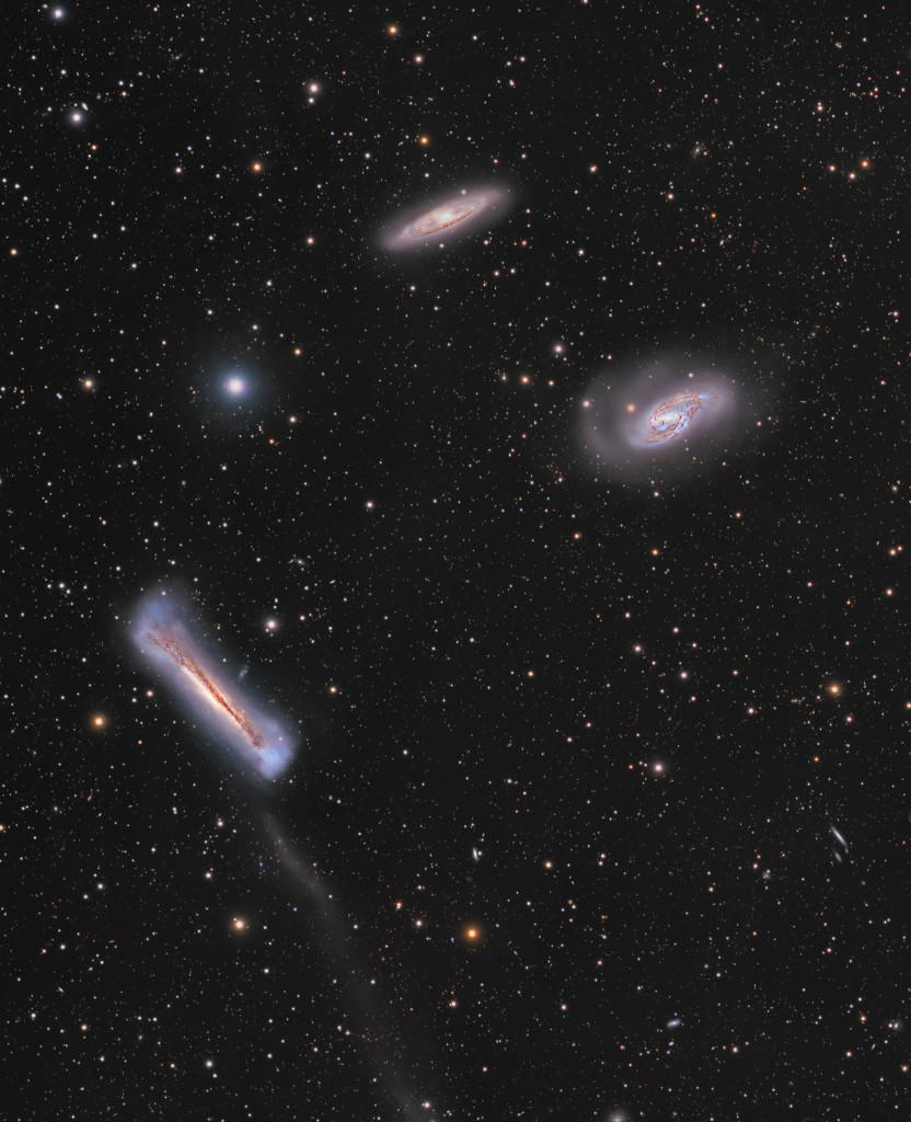 This popular group leaps into the early evening sky around the March equinox and the northern hemisphere spring. Famous as the Leo Triplet, the three magnificent galaxies found in the prominent constellation Leo gather here in one astronomical field of view. Crowd pleasers when