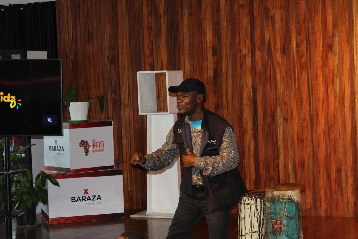 Afro_Kidz's tweet photo. The kids are fully engaged as our featured author, Atulo Francis, brings an African story to life in the Kids Lit club with @BarazaLab , with his captivating reading.
#KidsLitClub #AfricanStories #Storytime #ReadingForKids #AfroKidz #BarazaMediaLab #FunForKids https://t.co/MLk2THabTv
