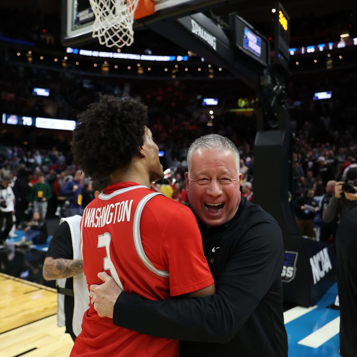 Love this one of Coach Dave and Tru! #GoLobos