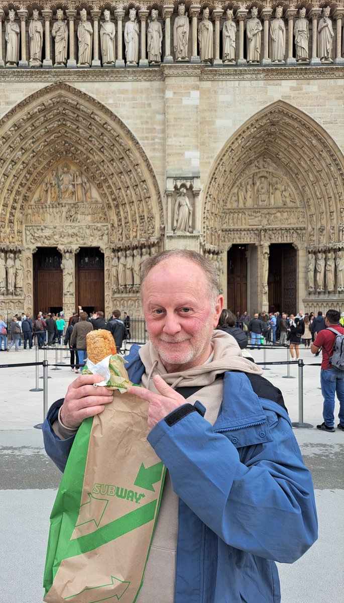 I'm in #Paris, in front of a certain cathedral, and that's the lunch pack of Notre Dame.