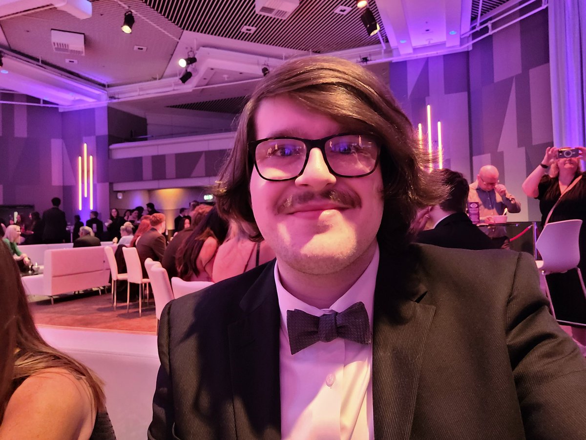 Why am I in Birmingham, why do I have a mustache, why am I dressed like James Bond