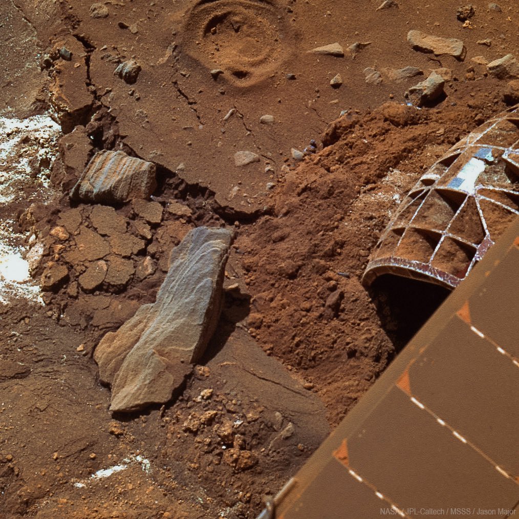 The last signal from <a href="/NASA/">NASA</a>'s Spirit Mars rover was received 15 years ago today on March 22, 2010. This is its last color picture, looking down at the ground around its partially-buried wheel, taken three weeks earlier.