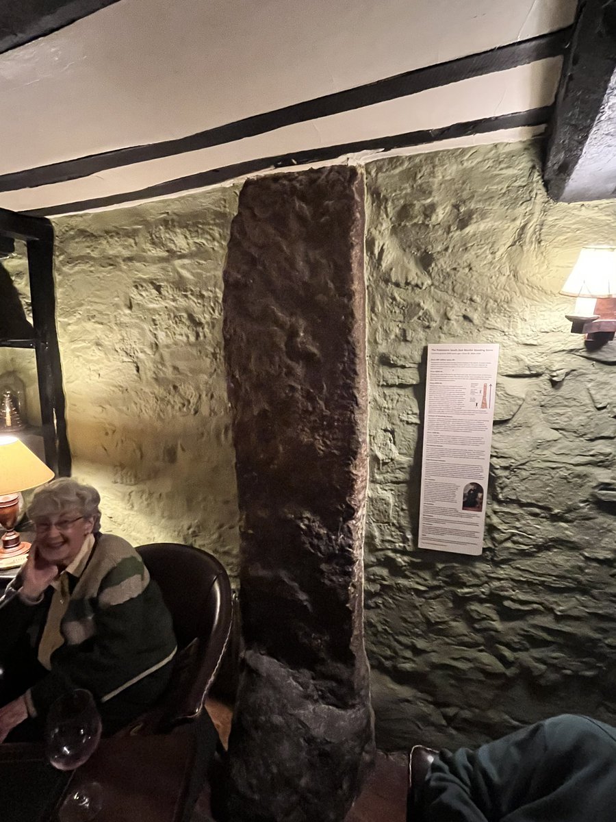 The South Zeal Mentir Standing Stone
In the snug at The Oxenham Arms, Devon . Carved by humans from solid granite over 5000 years ago before the wheel or metal tools were invented then placed by those people here in what came to be known as the village of South Zeal.