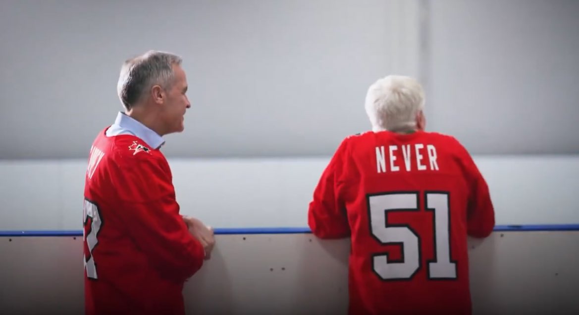<a href="/MarkJCarney/">Mark Carney</a> Mike Myers with the subtle “Never 51” jersey is a legendary touch