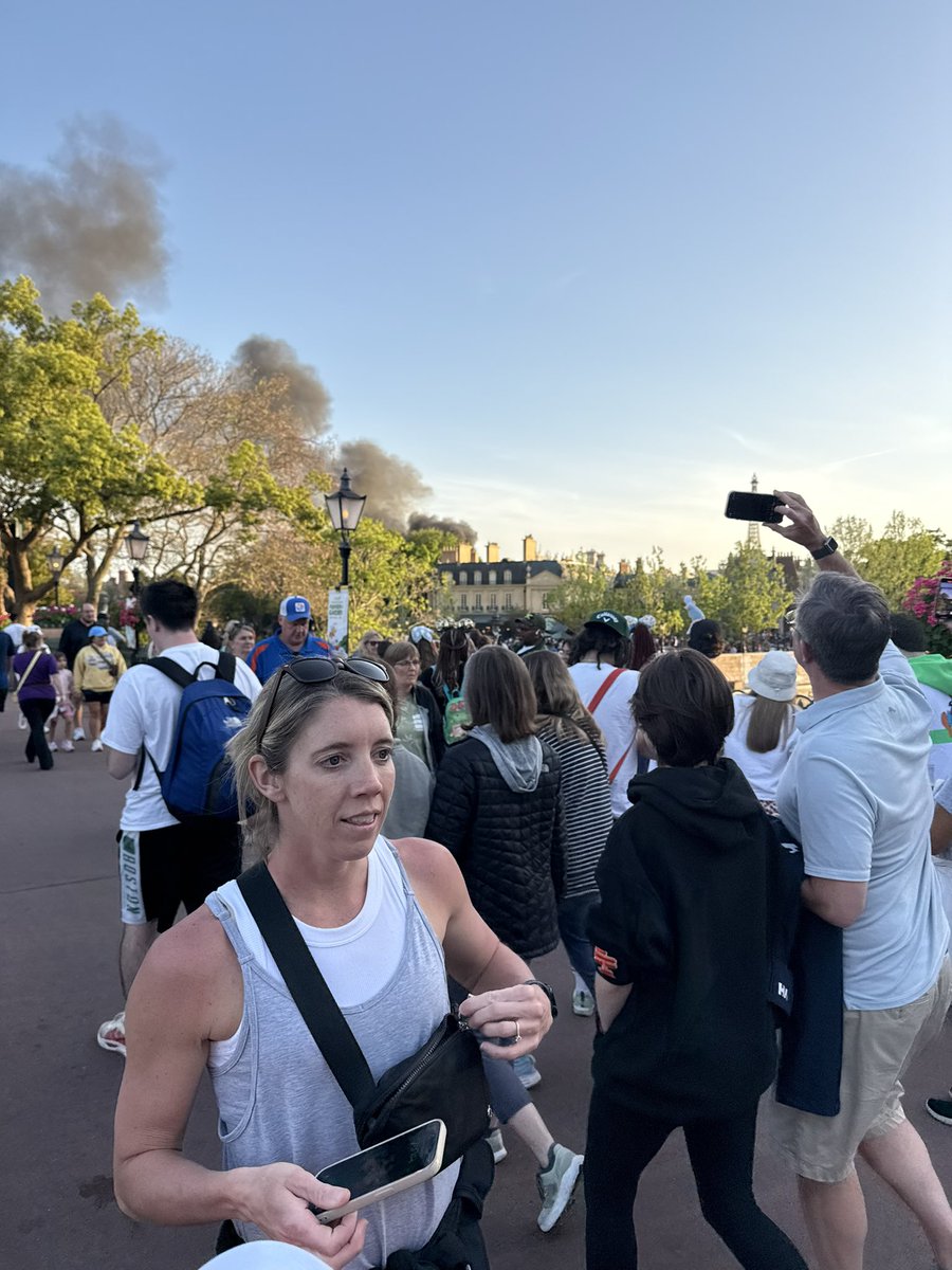 CryptoBroCode's tweet photo. Fire behind France pavilion at Epcot.  CMs as clueless and worried as the crowd. No sirens to be heard. https://t.co/81QfjiCoHV