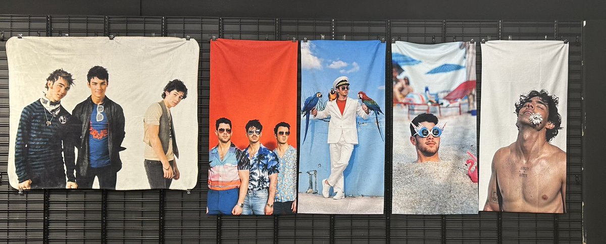 1DJonas5SOS's tweet photo. They let a few of us go shopping for merch early today. Here’s some of the #jonascon merch for tomorrow!! https://t.co/tT0kan9FhH