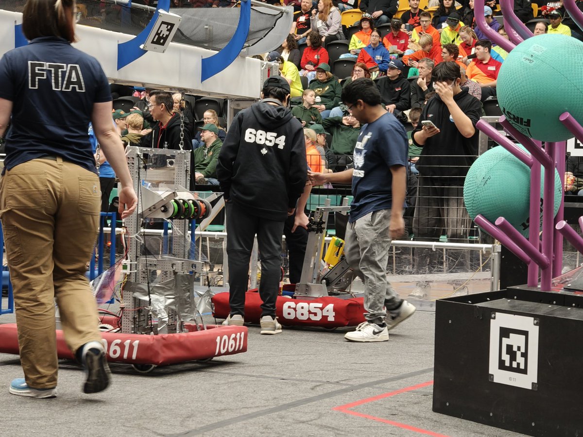 Did we win? Nope! But we did get a photo of our robot (with googly eyes) on the pit today! 👀🤖

📸: Matthew Cheng (teammate)