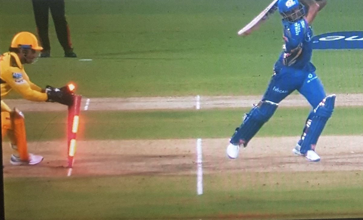 NeecheSeTopper's tweet photo. ms dhoni's gloves kissing the stumps delivering a wicket is my favorite genre of romance! https://t.co/sqepRP7X3G