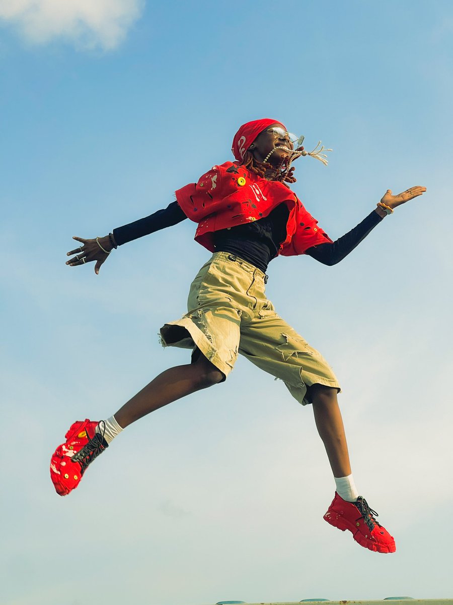 TGSTAR4EVER's tweet photo. Red Leap: Soaring in style. ❤️🦅

📍LASU

#shotoniphone 

Retweets are highly appreciated. ❤️ https://t.co/EPfvCS865Z