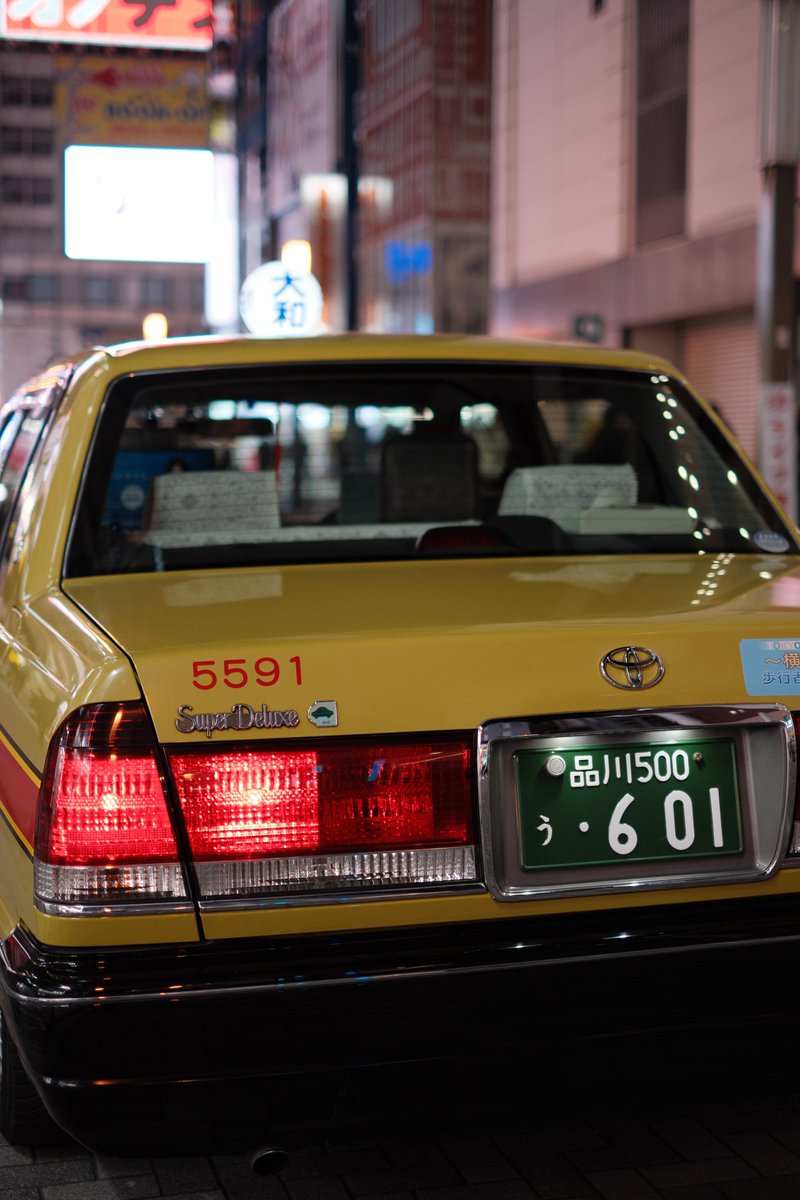 Yellow taxi at Akihabara Station at night, ready for passengers. #fujifilm #fujifilmxt5 #xf35mmf14 #akihabara #tokyovibes #yellowcab
