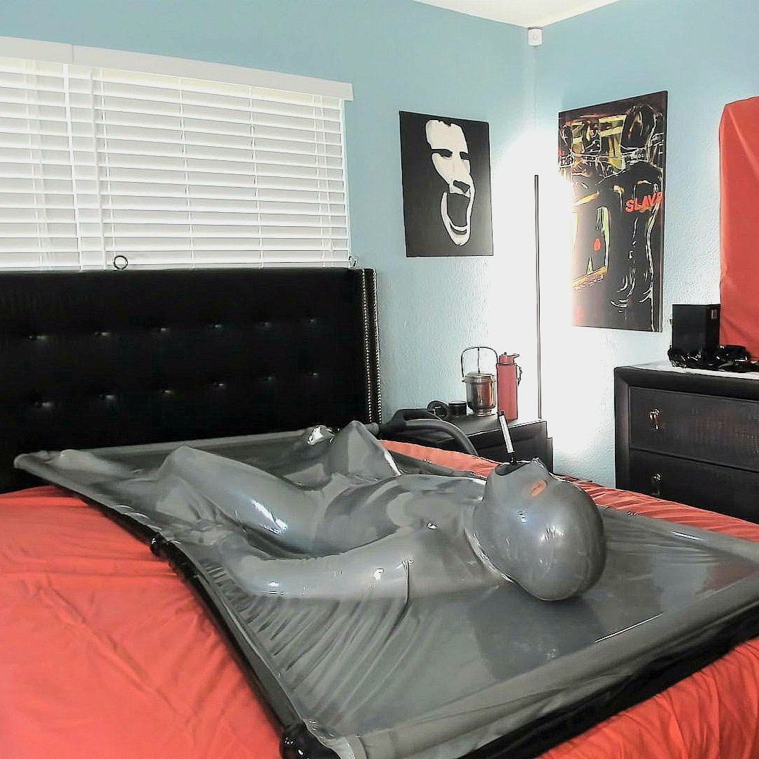 That suction type of #sealedinlatex feeling for the #trappedinlatex #rubbergimp whos wearing a #skintight #rubberprisonsuit inside  the #vacbed.
 #latexgimp gimp. #Tightlyrubberd #rubberslave #lockedinrubber #gimpinlatex #faceentrysuit #chastity