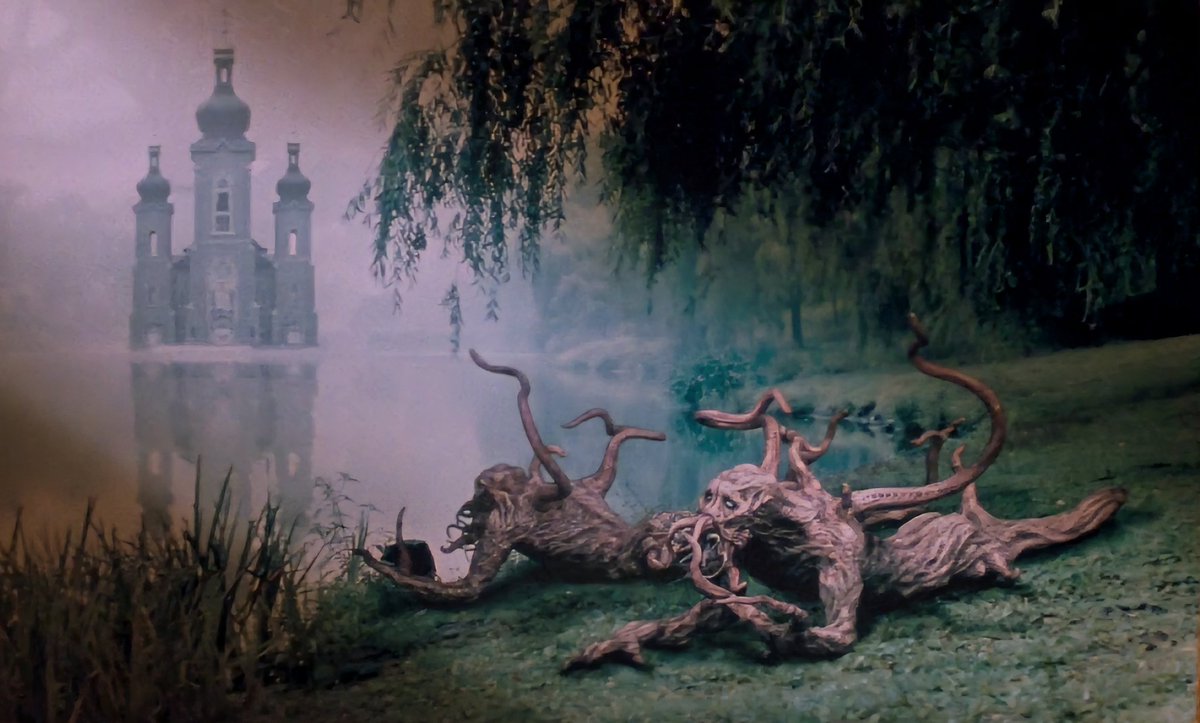 RJCrowtherJr's tweet photo. In the Shadow of the Black Church.  I love this Lovecraftian painting in the Pickman Hotel in John Carpenter's In the Mouth of Madness. #SinisterSunday https://t.co/XcEAbzSv08