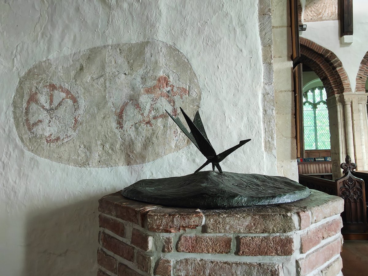 Matedwards7's tweet photo. For #MedievalMonday here's the old and the new at St Mary's Church at Polstead in Suffolk. A relatively new font with a fibreglass lid that represents the River Jordan stands in front of early medieval wall paintings believed to represent the Wheel of Life. https://t.co/vxfh7GWeyU