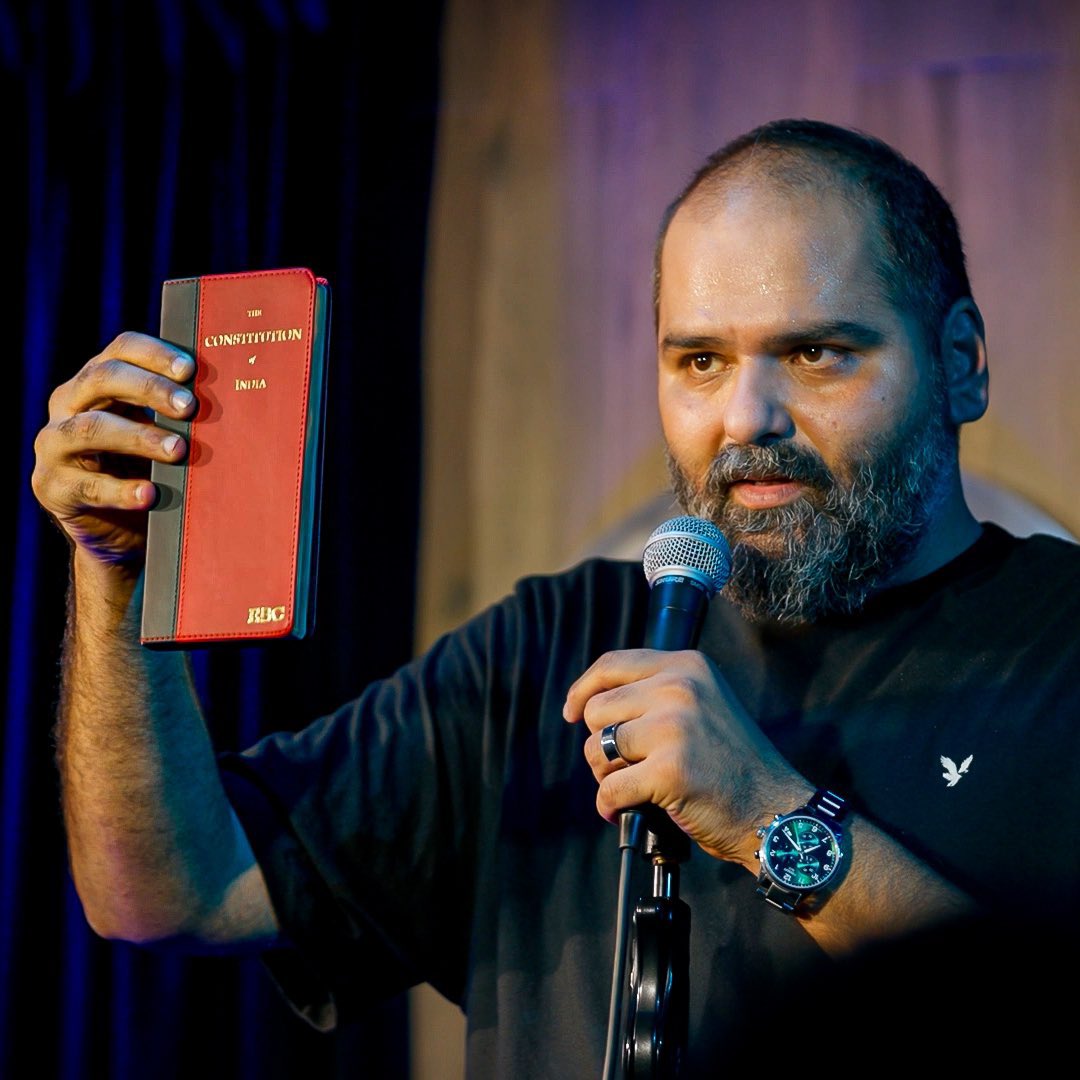 Comedian Kunal Kamra posted a photo of himself holding the Constitution of India on social media, writing, “The only way forward…” after his recent stand-up special, Naya Bharat, triggered a hate campaign by the Shinde-led Shiv Sena, leading to threatening speeches against him,