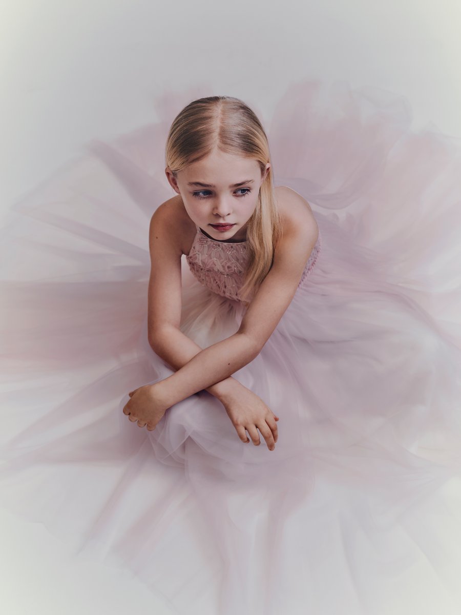 Dior's tweet photo. Delight in the pink tulle fairytale of #BabyDior couture by Cordelia de Castellane, featuring a pleated duo of pearlescent macramé and butterfly-dotted dresses, as seen in the latest digital issue of Petit Mag. Discover more enchanting content https://t.co/75AUQJuuL9. https://t.co/dOvkEpxtXr