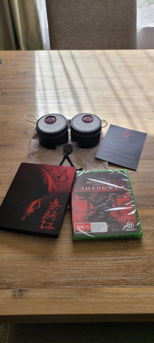 Plasma_43's tweet photo. A big thanks to @UbisoftANZ for sending out this little package to celebrate the launch of Assassin's Creed shadows! The candles smell so good and the case is amazing to look at! https://t.co/JlTZqF4HMQ