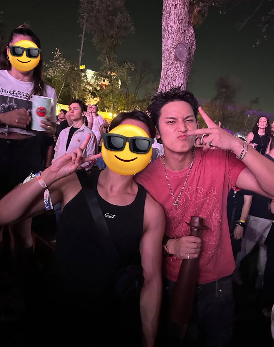 minwonshu's tweet photo. more of mingyu at the audience area of tecate pal norte 🖤 he took photos with other festival goers #민규 #세븐틴 https://t.co/GkkKBOxGUW