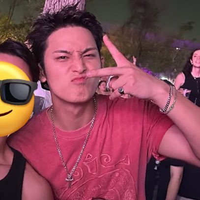 minwonshu's tweet photo. more of mingyu at the audience area of tecate pal norte 🖤 he took photos with other festival goers #민규 #세븐틴 https://t.co/GkkKBOxGUW