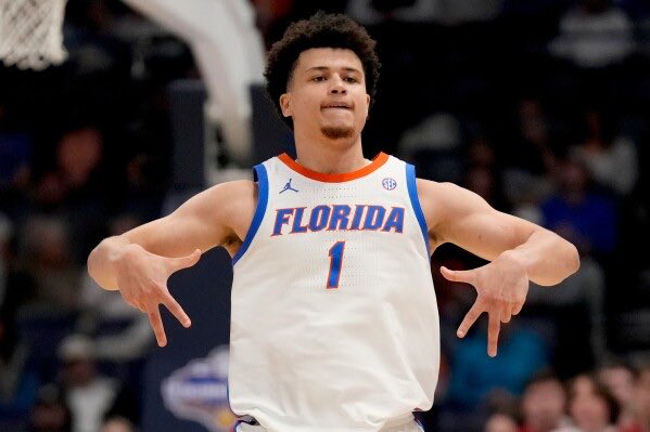 CBKReport's tweet photo. WALTER CLAYTON JR. IN THE FINAL FOUR:

34 POINTS
11/18 FG
5/8 3PT
7/7 FT

MARCH MADNESS LEGEND. 🐊 https://t.co/H2Hr40qK2p