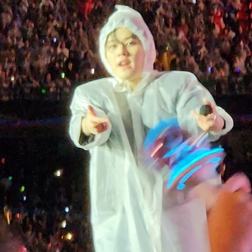 HE LOOKS SO BABY IN THAT RAIN PONCHO OH 😭😭😭😭😭