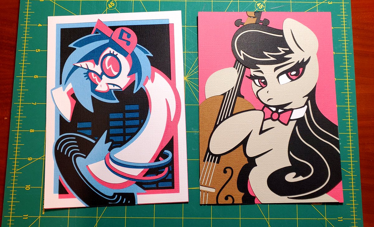Vectorized a couple of my older artworks I liked, then cut/built them out of cardstock layers, I think this could be a cool alternative to prints!