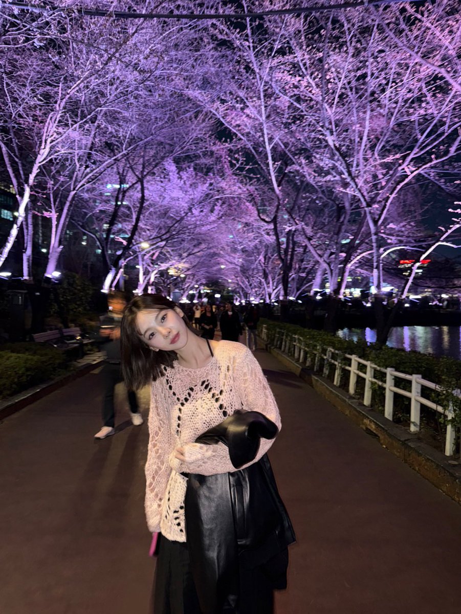 hourlykrn's tweet photo. karina with cherry blossoms🌸 https://t.co/b7Q3jIWscH