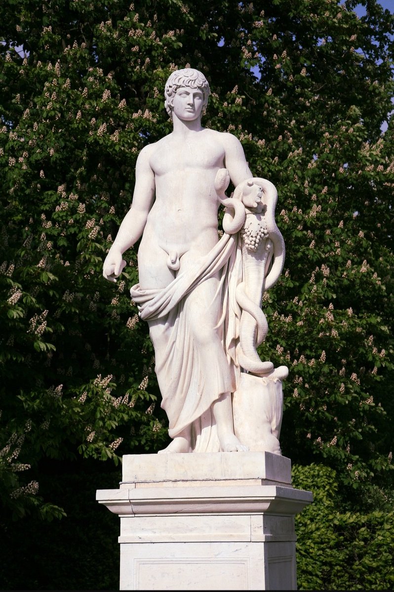 antinousgaygod's tweet image. 🪷 Replica copy of the #Antinous #Agathodaimon (Blessed Spirit) statue at Frederick the Great's Sanssouci Palace outside Berlin.  The original statue is at Berlin's #AltesMuseum. A beneficent apotropaic serpent emerges from a cornucopia to gaze up adoringly at #Antinoos 🪷