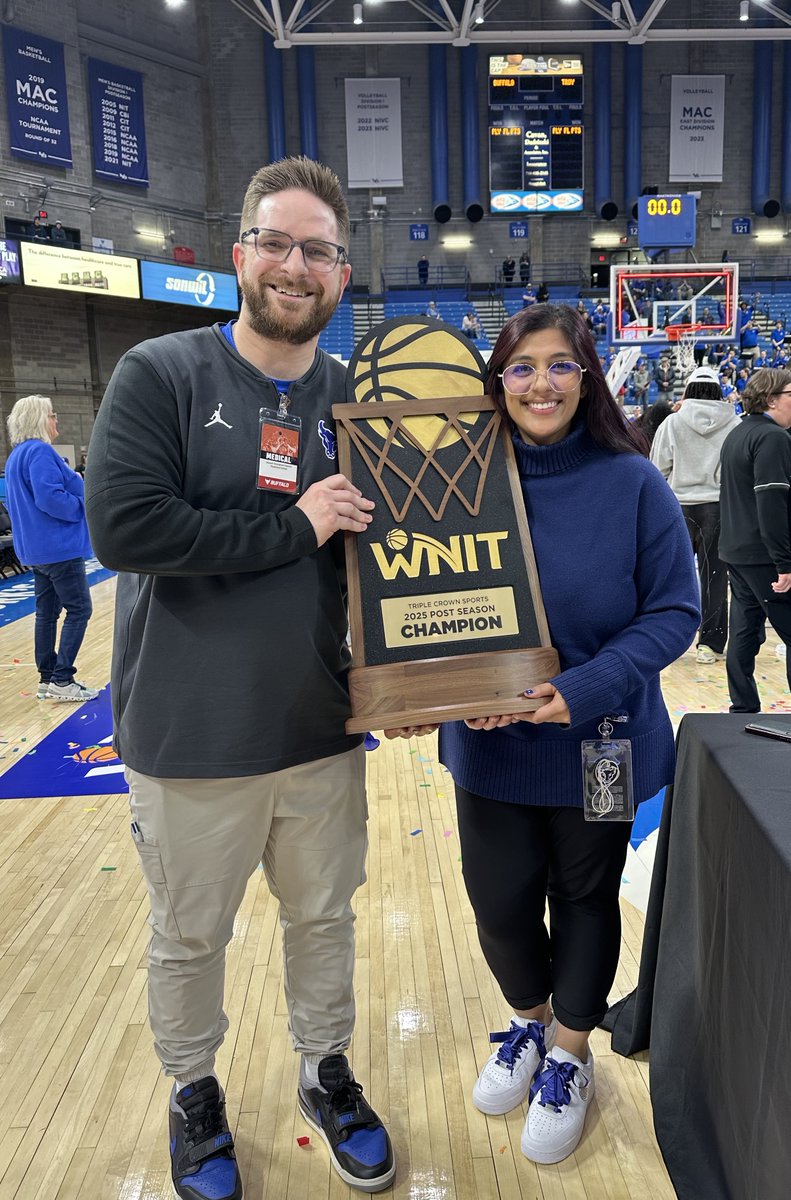 UBMDOrtho's tweet photo. Congrats to the University at Buffalo (@UBuffalo) women’s basketball team on winning the WNIT Championship! 🏀🏆 Dr. Joey Tousignant and Dr. Simran Singh, two of our Primary Care Sports Medicine Fellows pictured here, are proud to help care for the UB Bulls! #TeamDocs https://t.co/s3jrbcyPuA