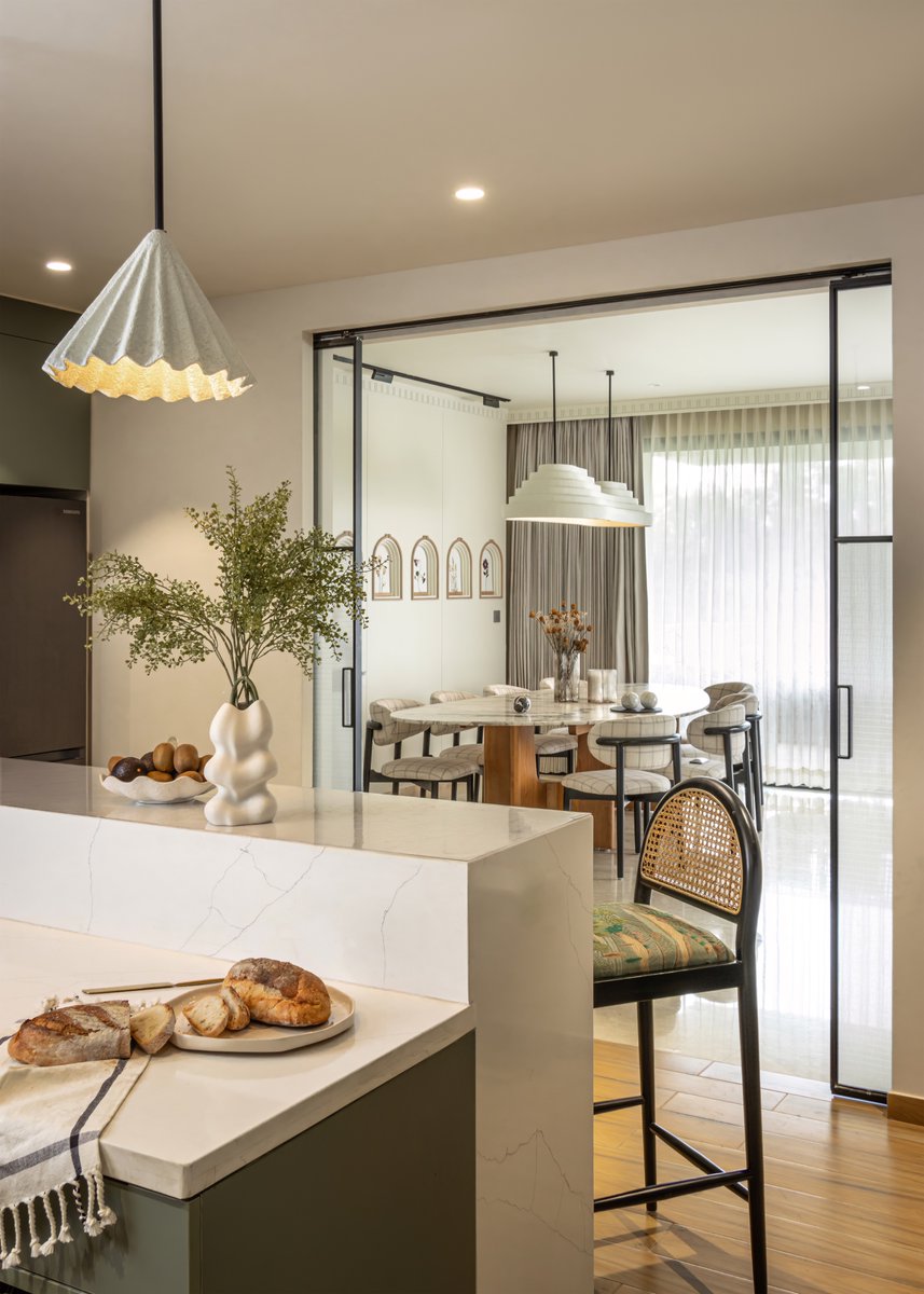 studioipsa's tweet image. Originally enclosed and dimly lit, Kaia’s kitchen now opens into light and warmth.
Pocket doors with fabric glass offer privacy during satsangs without losing elegance.
Muted sage greens, soft curves, and custom lighting bring calm and quiet joy to the space.
#KitchenDetails