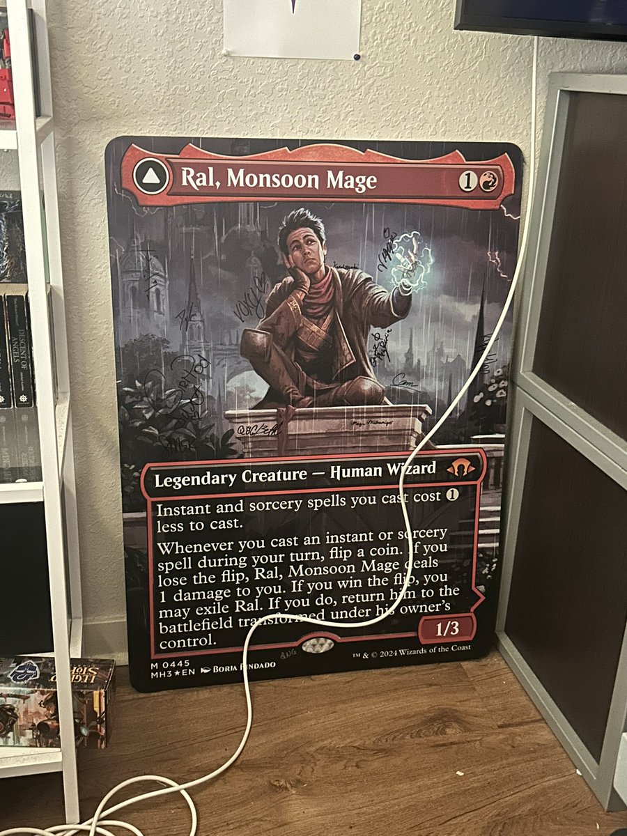 It's really cool that I have this awesome signed giant card of Ral, Monsoon mage but I hate the fact that everytime I bottom I have to face the card away from the bed