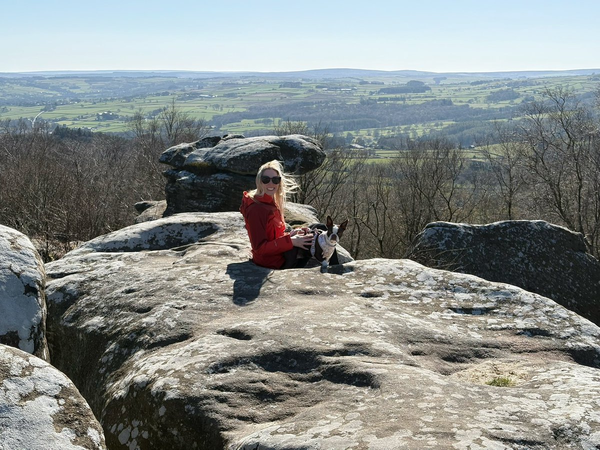 Sitting on a rock with a dog!