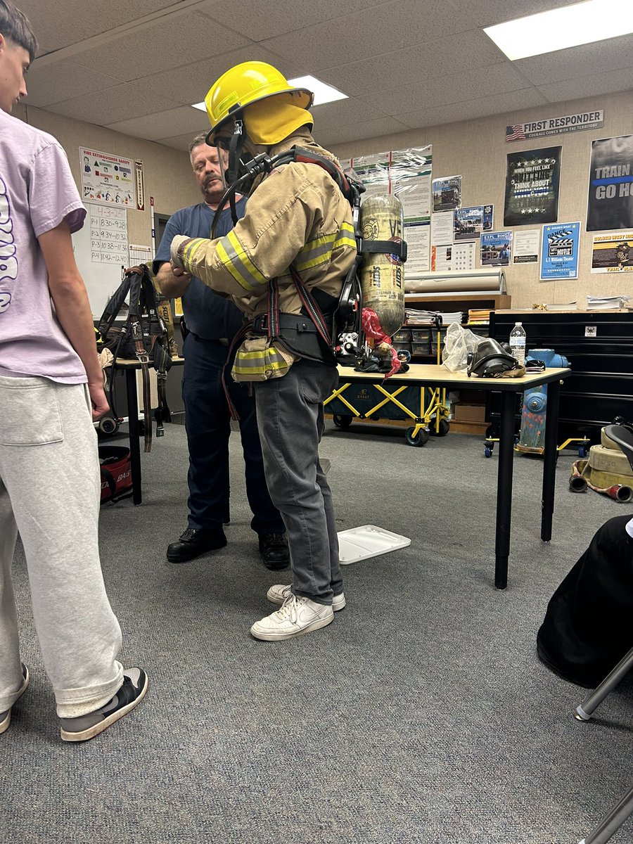 Last week Visalia Fire Battalion Chief Hughes met with the Golden West Academy of First Responder students and demonstrated donning and doffing of Self-Contained Breathing Apparatus (SCBA). This gives the students a chance to experience the conditions and weight of wearing them.