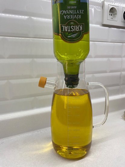 denetlecomtr's tweet photo. Kristal marka 1 litre riviera zeytinyağı ürününün içinden 900 mililitre çıktığı görüldü. https://t.co/01iOPNuWB1