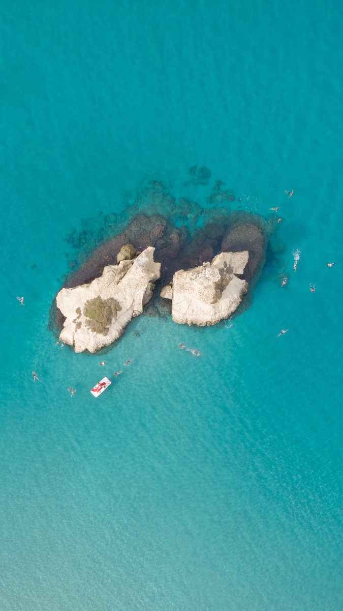 Hidden gems of Puglia 
Just a few swims away from Bari — where limestone rocks float in a sea of pure turquoise. #italy #aerial #drone #mavic #dji