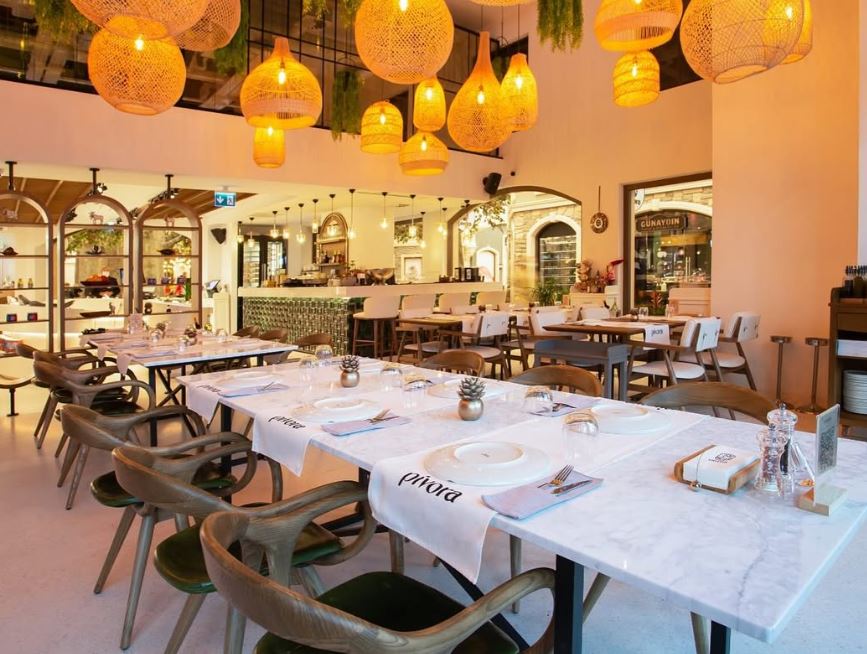 Sia_Moore's tweet photo. The application drawings and implementation of Pivora Restaurant, which we completed the design of and received the BIG SEE Award, were realized. Blending Mediterranean elegance with luxury and boho-chic aesthetics, Pivora is located in IstinyePark, Izmir. https://t.co/cNcL0v0X4X