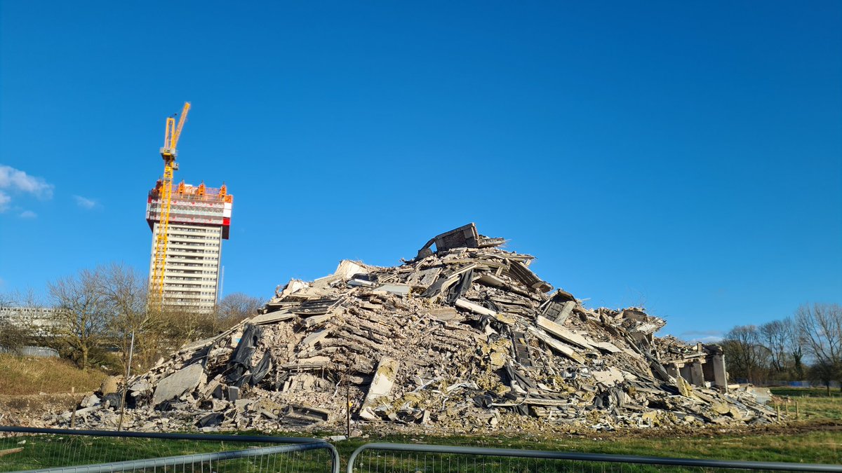 is_glasgow's tweet photo. The remains of one of the Wyndford Towers, which was recently demolished by a controlled explosion. The final tower, still visible in the background, will be taken down more gradually.
#glasgow #wyndford #towerblock #urbanrenewal #maryhill https://t.co/HacFZktL15
