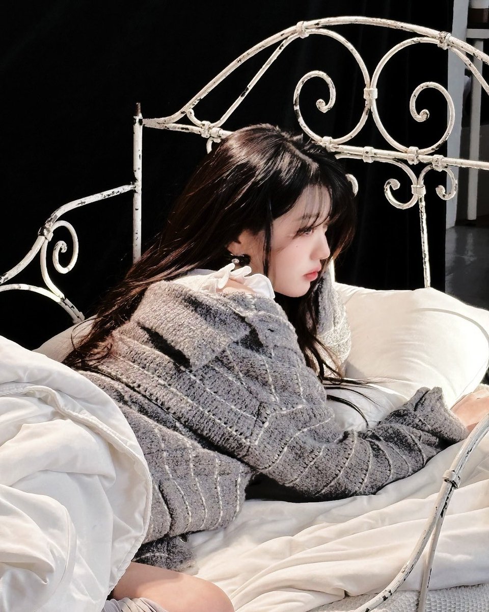 She’s  a  dreamer, a soul caught  between  the 
fading   embers   of  dusk   and    the   nascent
whispers   of   dawn,    a    muse    draped     in 
twilight's ethereal  embrace,  her distant  gaze   
a       haunting        tableau         of       yearning