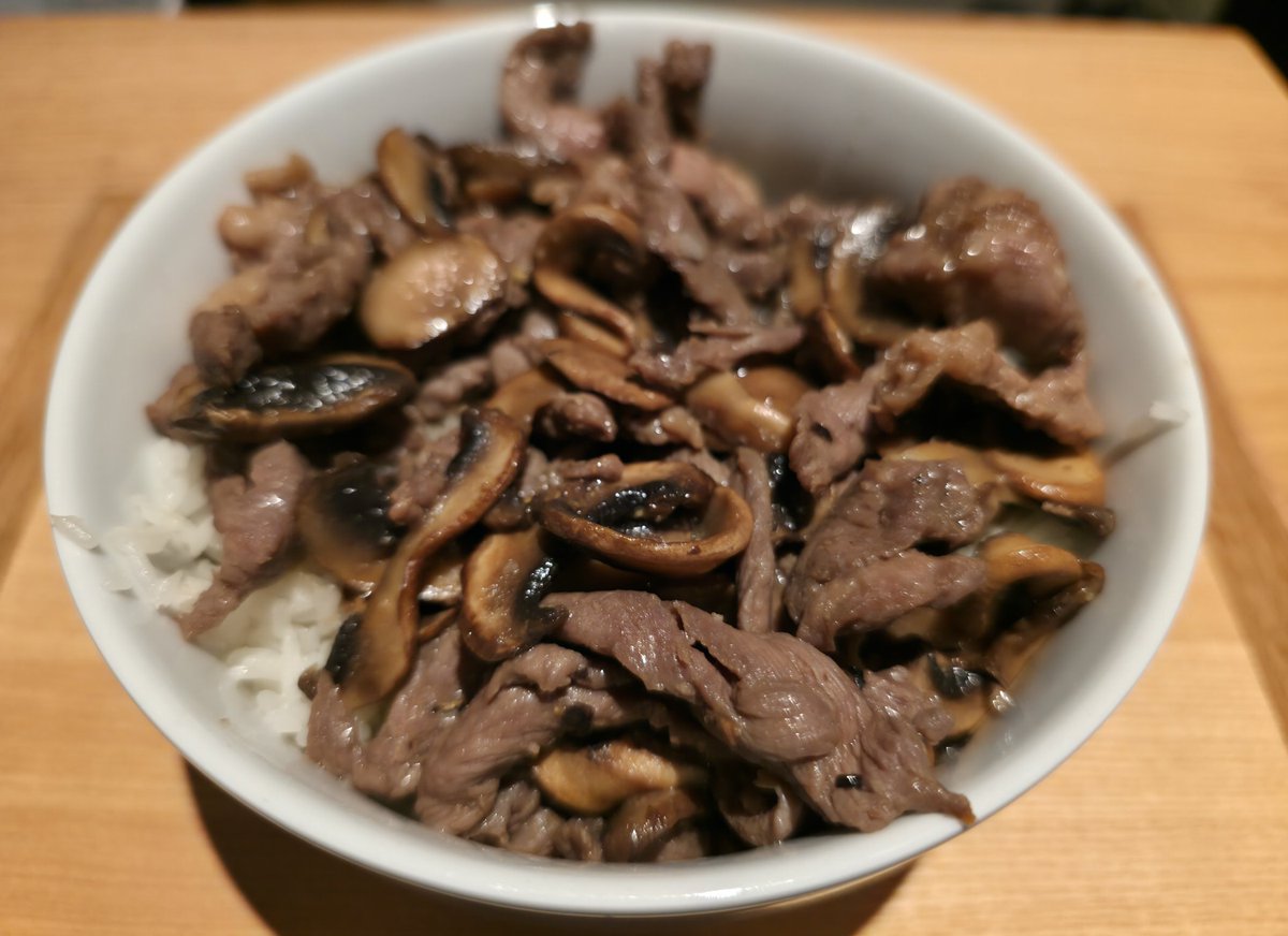 Food of the Day. Beef bulgogi and mushroom on top of Rice.