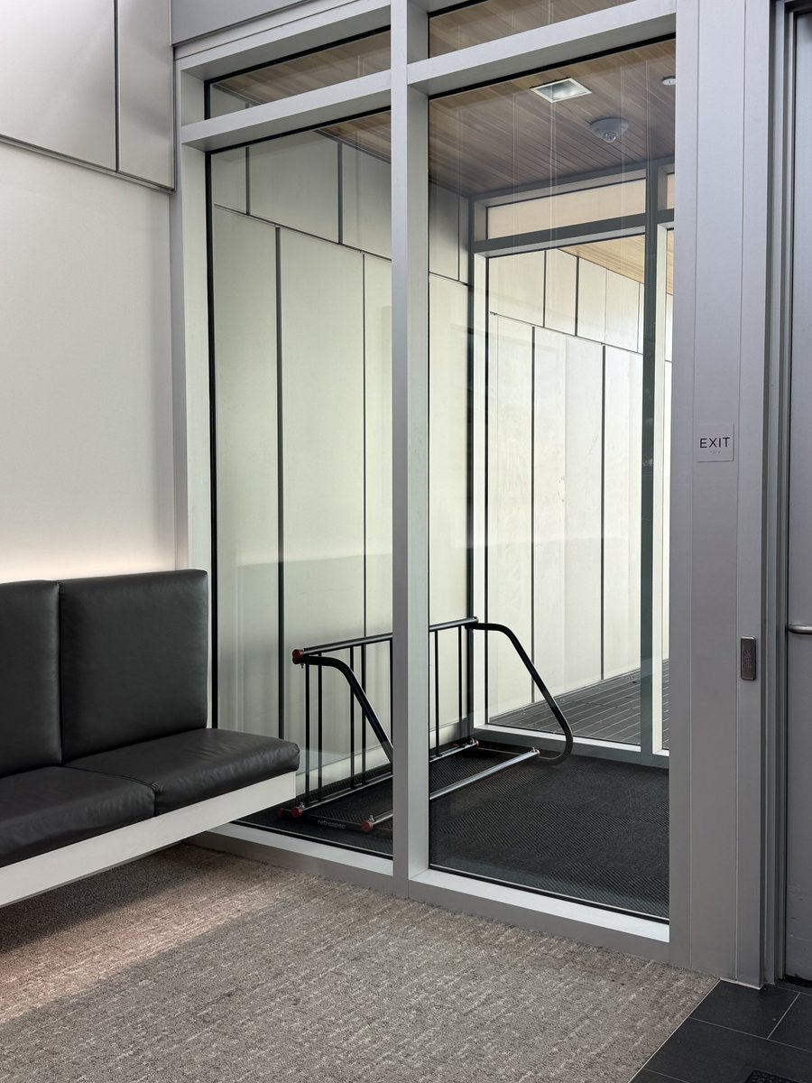 I’ve been storing my bike in this vestibule for years. Today I noticed my employer added an indoor bike rack. Be the change🫡