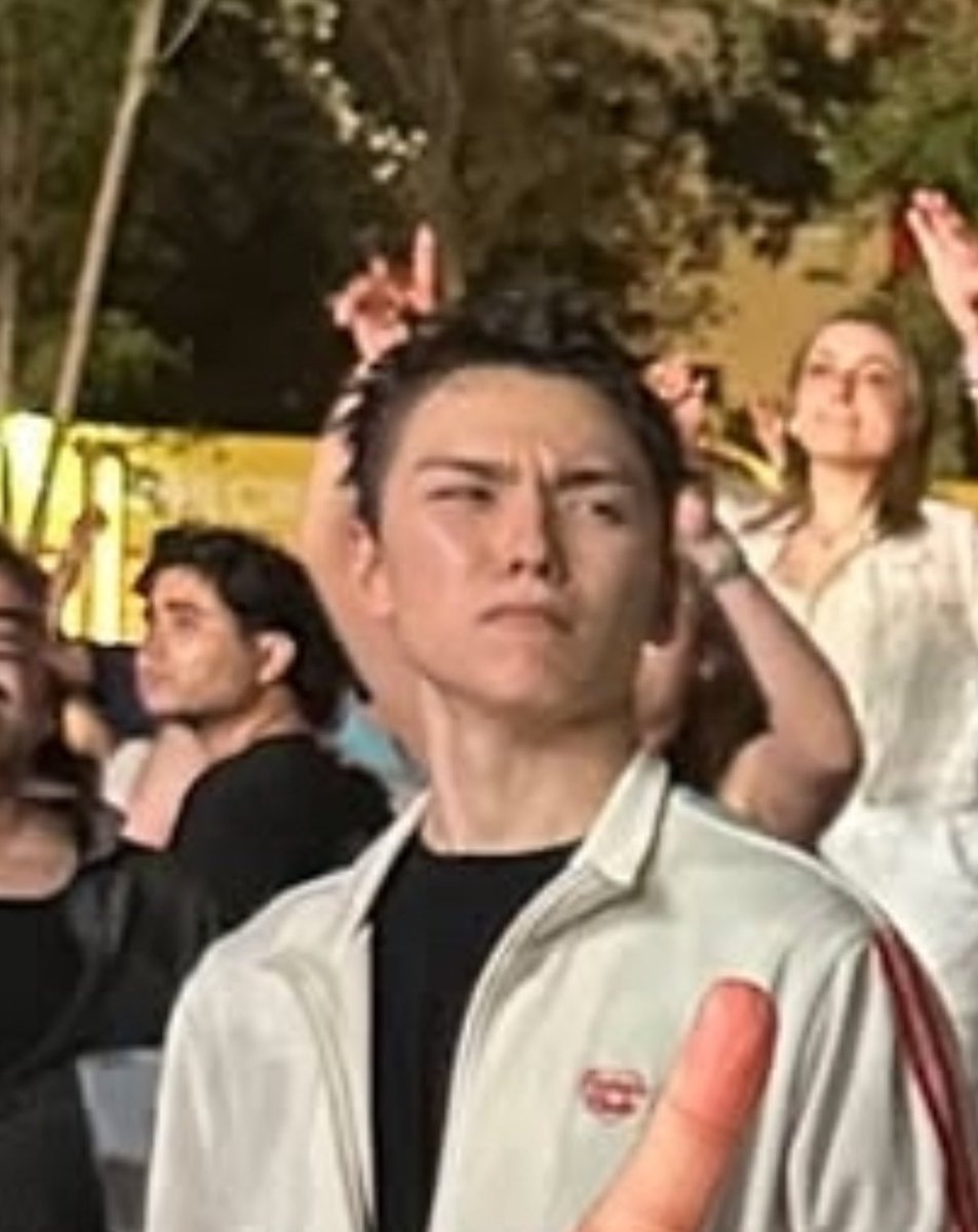 everywon_lai's tweet photo. y’all…… my friend’s friend took a picture with mingyu during pal norte!! vernon’s face in the background please 😭 https://t.co/VXYD0wchQy